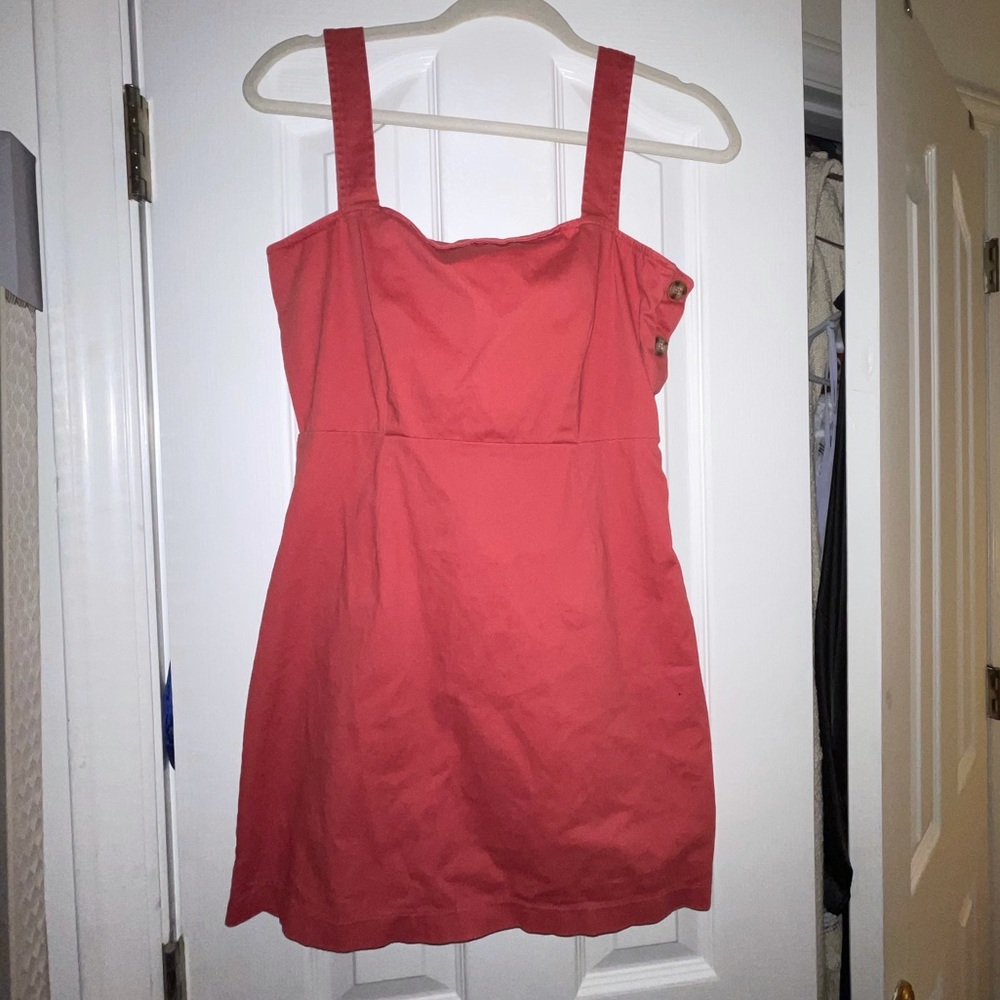 Pink mini dress with button detailing